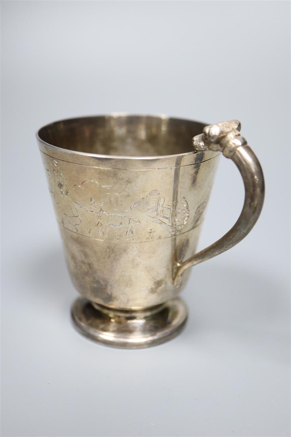 A 1930s Art Deco silver christening mug with dogs head handle and engraved with Little Bo Peep & 3 curling stones.